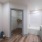 closet in bathroom with shower/tub combo