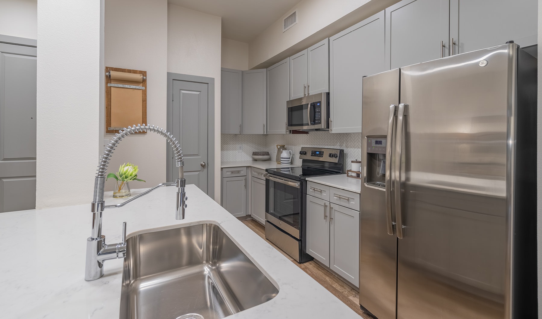 The Essence of Exceptional Living bright kitchen with high ceilings